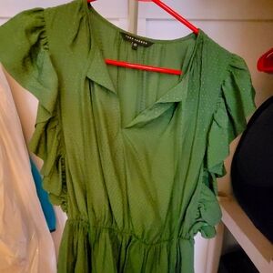 Short sleeve, stylish Tara Jarmon blouse/top.  The cut is flattering.  Green.